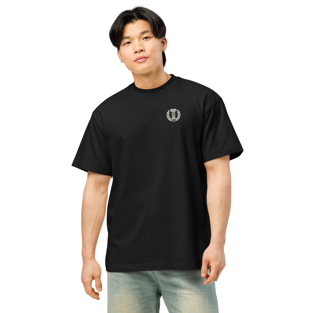 Person wearing a black t-shirt with a logo on a white background