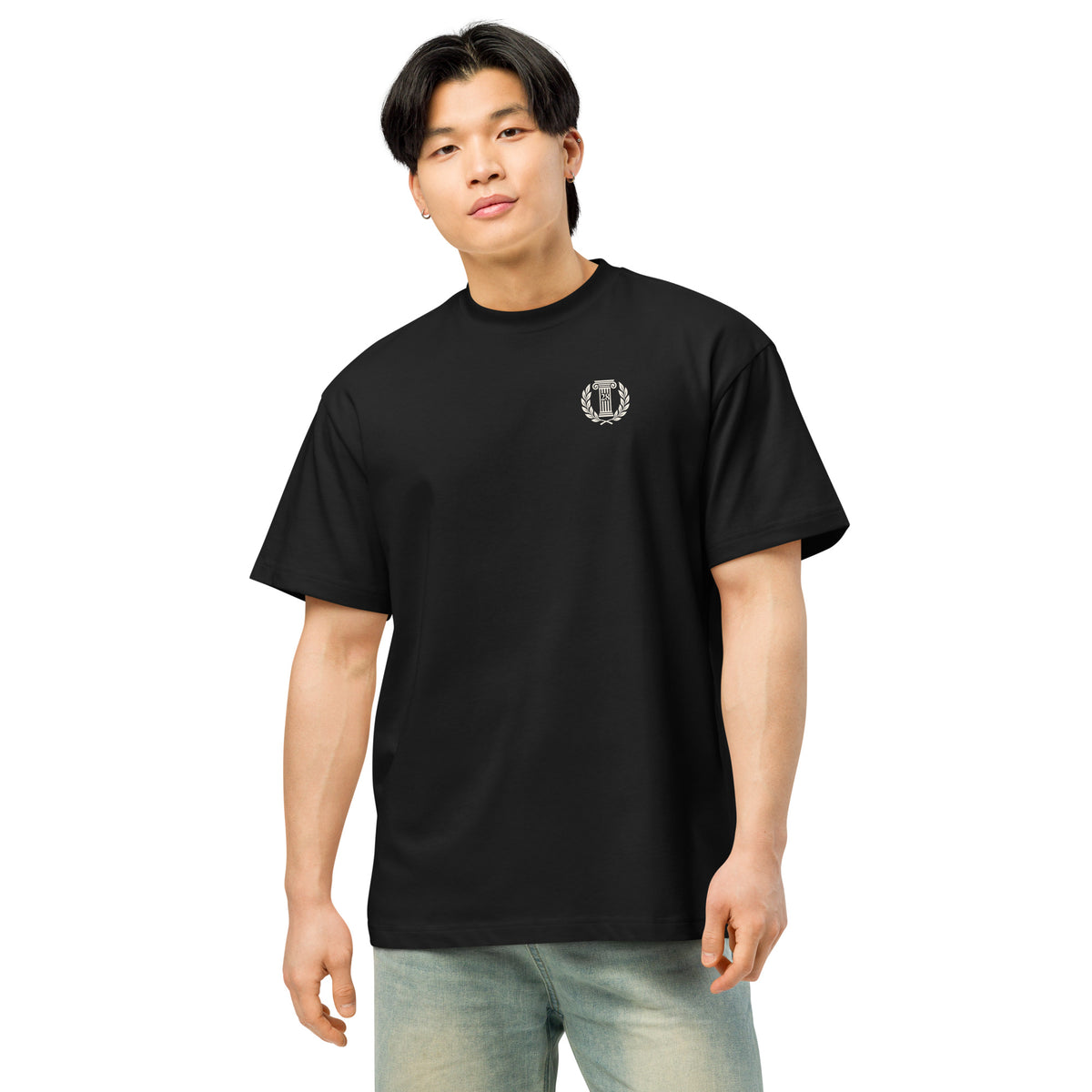 Person wearing a black t-shirt with a logo on a white background